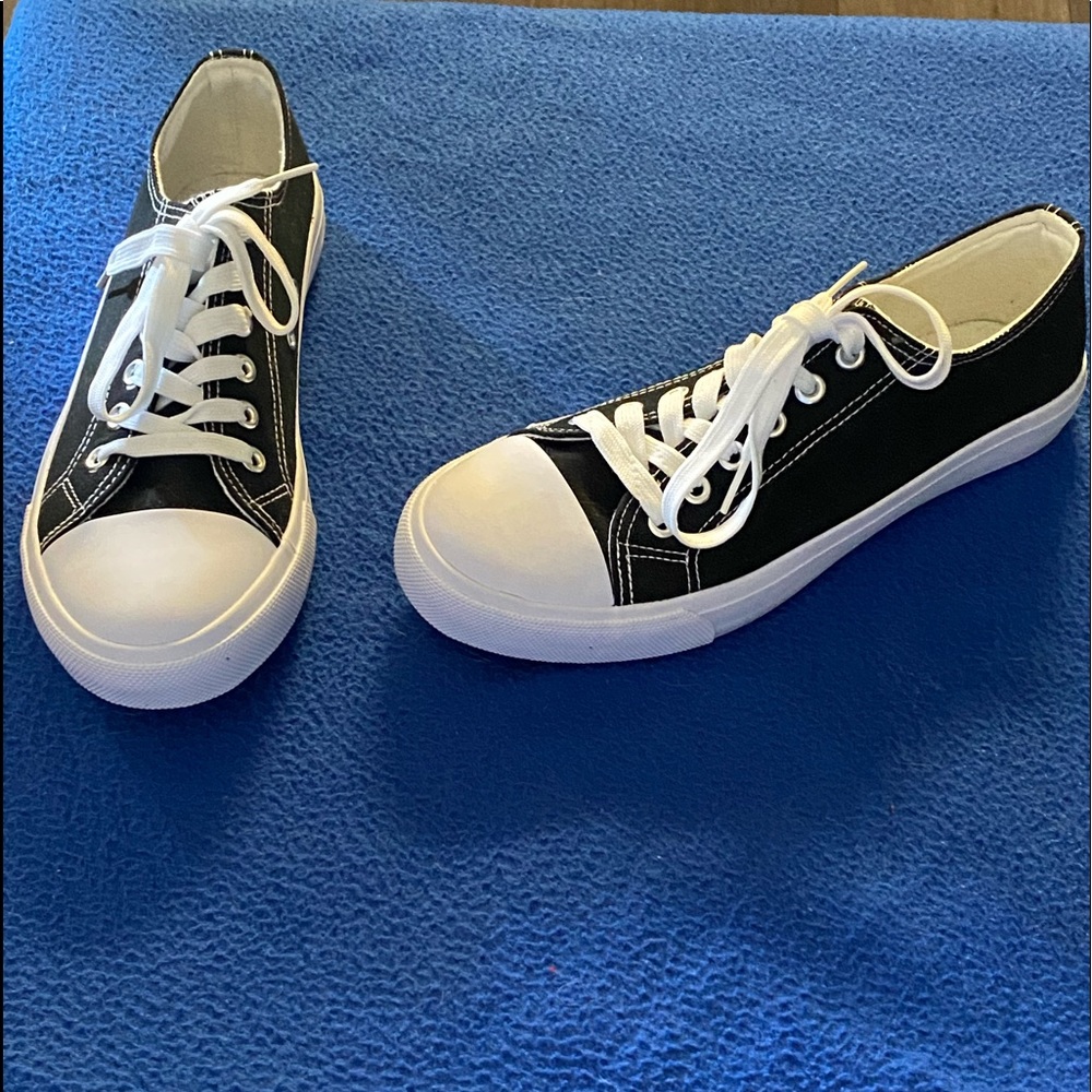 Black canvas sneakers.  Never worn. Size 8